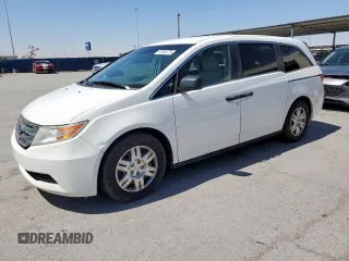 2011 Honda Odyssey LX z VIN 5FNRL5H21BB099854, wystawiony jako Copart lot #57969775 z przebiegiem 192 909 mil mil oraz Czysty tytuł • Clean title. Historia ofert i sprzedaży dostępna na DreamBid. Obrazek 1.
