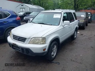 2000 Honda CR-V SE z VIN JHLRD1870YS022201, wystawiony jako IAAI lot #42527115 z przebiegiem 232 081 mil mil oraz . Historia ofert i sprzedaży dostępna na DreamBid. Obrazek 2.