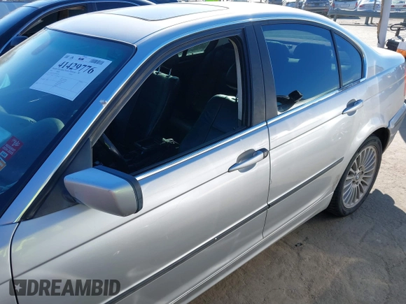 2003 BMW 3 Series 330xi with VIN WBAEW53493PN30296, listed as a IAAI auction lot 41429776 with 233,013 mi miles. Bid and sale history available at carsss.com. Image 14.