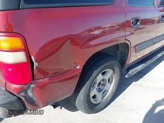 2003 Chevrolet Tahoe LS z VIN 1GNEK13Z73R127111, wystawiony jako IAAI lot #41830248 z przebiegiem Nie podano mil oraz . Historia ofert i sprzedaży dostępna na DreamBid. Obrazek 12.