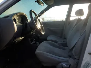 1998 Ford Escort SE with VIN 3FAFP15PXWR242102, listed as a Copart auction lot 77914714 with 164,333 mi miles and Salvage Title. Bid and sale history available at carsss.com. Image 7.