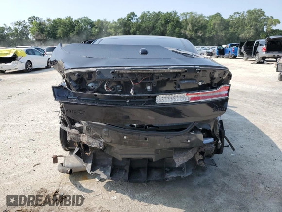 2014 Lincoln MKZ Hybrid z VIN 3LN6L2LU8ER811947, wystawiony jako Copart lot #59055965 z przebiegiem 150 760 mil mil oraz Szkoda całkowita • Salvage title. Historia ofert i sprzedaży dostępna na DreamBid. Obrazek 6.