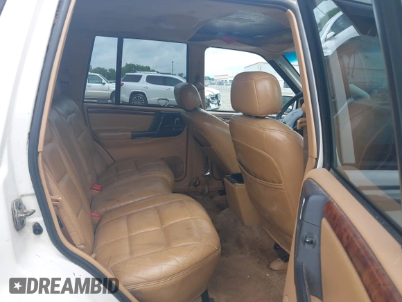 1996 Jeep Grand Cherokee Limited z VIN 1J4GZ78YXTC191527, wystawiony jako IAAI lot #42352616 z przebiegiem 325 927 mil mil oraz . Historia ofert i sprzedaży dostępna na DreamBid. Obrazek 8.