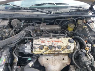 1995 Honda Accord EX w/Leather with VIN 1HGCD5568SA082456, listed as a IAAI auction lot 41806480 with 193,676 mi miles. Bid and sale history available at carsss.com. Image 10.