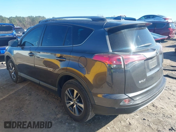 2018 Toyota RAV4 XLE with VIN JTMWFREV9JJ200629, listed as a IAAI auction lot 41821491 with 184,706 mi miles. Bid and sale history available at carsss.com. Image 3.