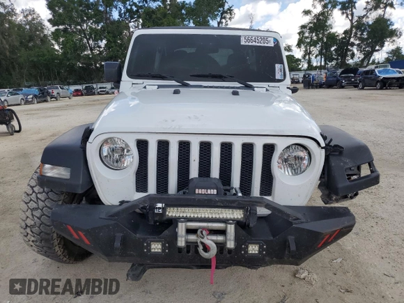 2023 Jeep Wrangler Sport с VIN 1C4HJXDGXPW596127, выставлен на аукционе Copart как лот 56645205 с пробегом 64 257 миль миль и Списание • Salvage title. История ставок и продаж доступна на DreamBid. Изображение 5.