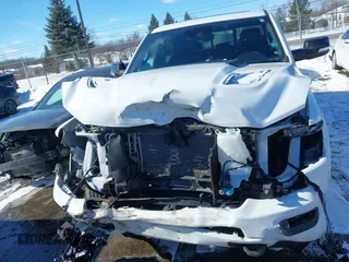 2021 Ram 1500 Limited with VIN 1C6SRFHT5MN548477, listed as a IAAI auction lot 41644894 with 51,429 mi miles and . Bid and sale history available at DreamBid. Image 12.