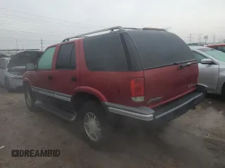 1995 GMC Jimmy SLE Convenience with VIN 1GKDT13W0S2519253, listed as a Copart auction lot 43536865 with 121,556 mi miles and Salvage Title. Bid and sale history available at carsss.com. Image 2.