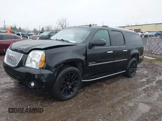 2014 GMC Yukon XL Denali with VIN 1GKS2MEF2ER219511, listed as a IAAI auction lot 41101470 with 187,326 mi miles. Bid and sale history available at carsss.com. Image 2.