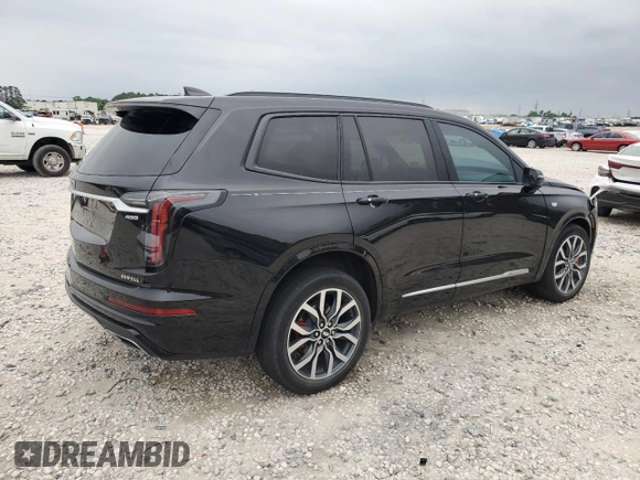 2023 Cadillac XT6 AWD Sport z VIN 1GYKPGRS6PZ126039, wystawiony jako Copart lot #55948605 z przebiegiem 39 966 mil mil oraz Szkoda całkowita • Salvage title. Historia ofert i sprzedaży dostępna na DreamBid. Obrazek 3.