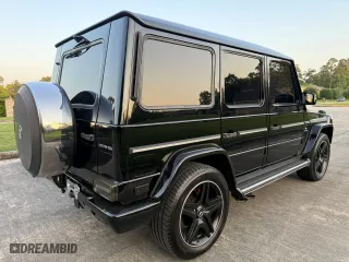 2014 Mercedes-Benz G-Class G 63 AMG with VIN WDCYC7DF2EX216331, listed as a Copart auction lot 53758145 with 128,205 mi miles and Clean Title. Bid and sale history available at carsss.com. Image 4.