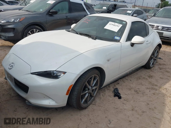 2021 Mazda MX-5 Miata Grand Touring with VIN JM1NDAM71M0454514, listed as a IAAI auction lot 41940252 with Not provided miles and . Bid and sale history available at DreamBid. Image 17.