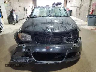 2013 BMW 1 Series 135i with VIN WBAUN7C5XDVM26903, listed as a Copart auction lot 60525595 with 219,810 mi miles and Salvage title. Bid and sale history available at DreamBid. Image 5.
