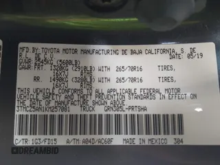 2019 Toyota Tacoma SR z VIN 3TMCZ5AN1KM257081, wystawiony jako IAAI lot #42211385 z przebiegiem 60 229 mil mil oraz . Historia ofert i sprzedaży dostępna na DreamBid. Obrazek 9.