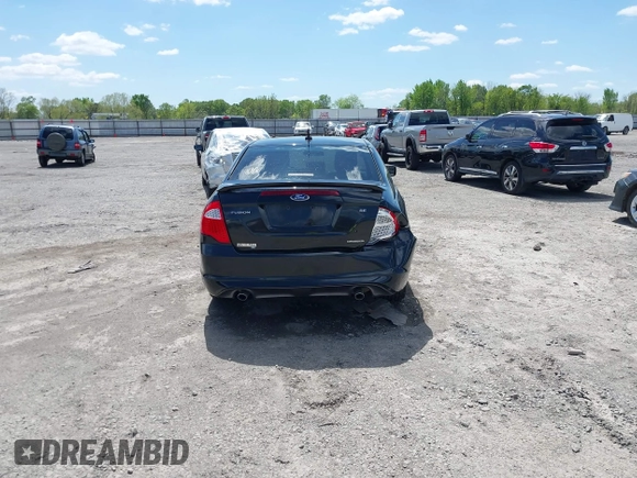 2012 Ford Fusion SE z VIN 3FAHP0HG8CR339020, wystawiony jako IAAI lot #41962046 z przebiegiem 136 072 mil mil oraz . Historia ofert i sprzedaży dostępna na DreamBid. Obrazek 16.