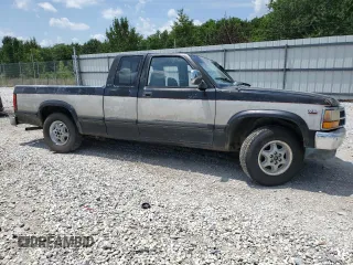 1995 Dodge Dakota z VIN 1B7GL23Y9SS385794, wystawiony jako Copart lot #63360094 z przebiegiem 394 435 mil mil oraz Szkoda całkowita • Salvage title. Historia ofert i sprzedaży dostępna na DreamBid. Obrazek 4.