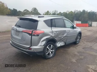 2018 Toyota RAV4 XLE with VIN 2T3WFREV3JW445654, listed as a IAAI auction lot 40849666 with 69,365 mi miles and . Bid and sale history available at DreamBid. Image 4.