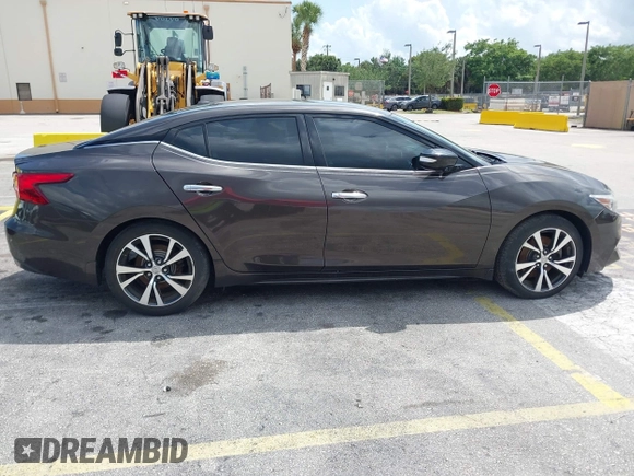 2016 Nissan Maxima SR with VIN 1N4AA6AP9GC405420, listed as a IAAI auction lot 41933739 with 59,680 mi miles and . Bid and sale history available at DreamBid. Image 13.