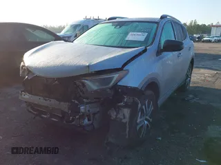 2017 Toyota RAV4 LE with VIN 2T3BFREV1HW607984, listed as a IAAI auction lot 41878970 with 136,941 mi miles and . Bid and sale history available at DreamBid. Image 17.