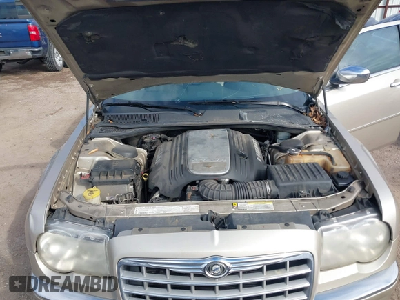 2006 Chrysler 300 C with VIN 2C3KA63HX6H487887, listed as a IAAI auction lot 41603068 with 133,169 mi miles. Bid and sale history available at carsss.com. Image 10.