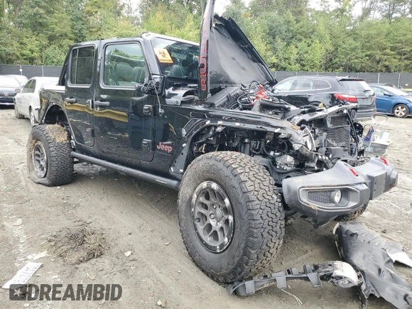 2023 Jeep Wrangler Rubicon with VIN 1C4HJXFN9PW507594, listed as a Copart auction lot 73111214 with Not provided miles and Salvage title. Bid and sale history available at DreamBid. Image 4.
