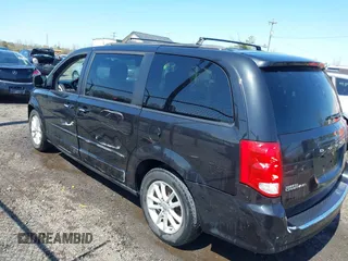 2015 Dodge Grand Caravan SXT with VIN 2C4RDGCG6FR548774, listed as a IAAI auction lot 41901232 with 141,589 mi miles and . Bid and sale history available at DreamBid. Image 3.
