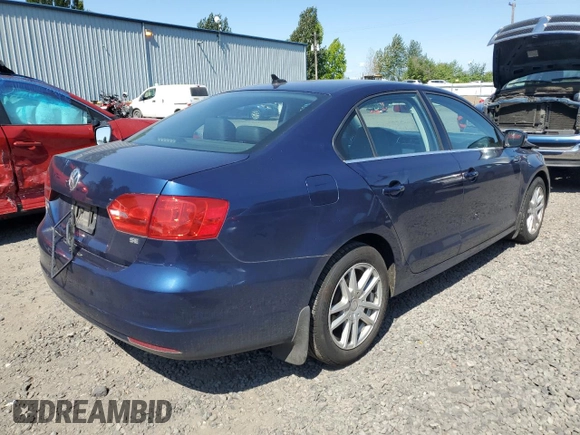 2014 Volkswagen Jetta SE with VIN 3VWD17AJ9EM323625, listed as a Copart auction lot 58211655 with 108,099 mi miles and Salvage title. Bid and sale history available at DreamBid. Image 3.