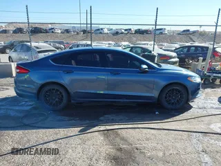 2018 Ford Fusion S with VIN 3FA6P0G77JR129224, listed as a IAAI auction lot 41483648 with 104,045 mi miles. Bid and sale history available at carsss.com. Image 13.