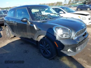 2014 MINI Paceman S with VIN WMWSS7C5XEWN72164, listed as a IAAI auction lot 41511586 with 132,983 mi miles and . Bid and sale history available at DreamBid. Image 1.