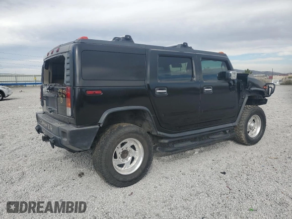 2004 Hummer H2 z VIN 5GRGN23U74H100175, wystawiony jako Copart lot #52642125 z przebiegiem 112 305 mil mil oraz Szkoda całkowita • Salvage title. Historia ofert i sprzedaży dostępna na DreamBid. Obrazek 3.