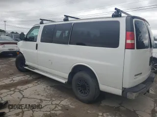2014 Chevrolet Express Passenger 1LT with VIN 1GAZGYFG9E1207695, listed as a Copart auction lot 62146754 with 108,836 mi miles and Salvage title. Bid and sale history available at DreamBid. Image 2.