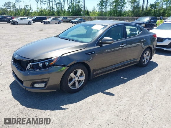 2014 Kia Optima LX with VIN 5XXGM4A71EG335165, listed as a IAAI auction lot 42052378 with 154,574 mi miles. Bid and sale history available at carsss.com. Image 2.