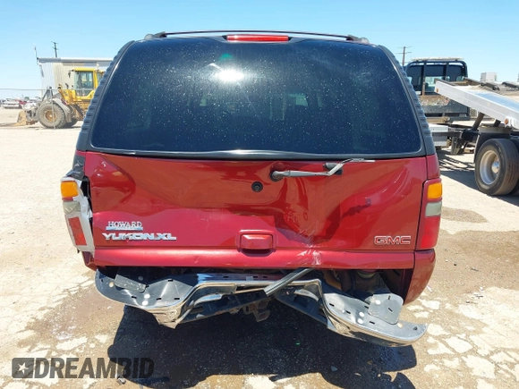 2003 GMC Yukon XL SLT z VIN 1GKEC16Z63J166423, wystawiony jako IAAI lot #42330690 z przebiegiem 190 589 mil mil oraz . Historia ofert i sprzedaży dostępna na DreamBid. Obrazek 16.