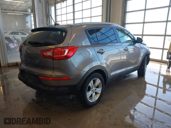 2012 Kia Sportage LX with VIN KNDPB3A23C7317650, listed as a IAAI auction lot 41631193 with 96,433 mi miles. Bid and sale history available at carsss.com. Image 4.