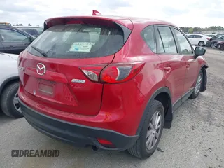 2016 Mazda CX-5 Sport with VIN JM3KE2BY9G0911535, listed as a IAAI auction lot 41906402 with 134,477 mi miles. Bid and sale history available at carsss.com. Image 4.