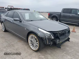 2018 Cadillac CT6 Luxury RWD z VIN 1G6KC5RX4JU159789, wystawiony jako IAAI lot #41145010 z przebiegiem 73 811 mil mil oraz . Historia ofert i sprzedaży dostępna na DreamBid. Obrazek 1.