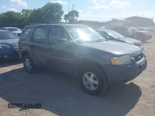2002 Ford Escape XLS Value with VIN 1FMYU01B32KD20469, listed as a IAAI auction lot 42553573 with 353,752 mi miles and . Bid and sale history available at DreamBid. Image 1.