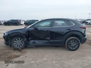 2021 Mazda CX-30 2.5 S with VIN 3MVDMAAL2MM303321, listed as a IAAI auction lot 41583346 with 57,122 mi miles. Bid and sale history available at carsss.com. Image 14.