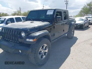 2021 Jeep Gladiator Willys with VIN 1C6HJTAG7ML523718, listed as a IAAI auction lot 42206058 with 48,071 mi miles and . Bid and sale history available at DreamBid. Image 6.