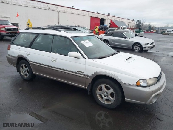 1999 Subaru Legacy Wagon Outback with VIN 4S3BG6852X7659898, listed as a IAAI auction lot 41298823 with 138,834 mi miles. Bid and sale history available at carsss.com. Image 1.