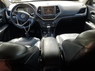 2015 Jeep Cherokee Limited z VIN 1C4PJMDSXFW676251, wystawiony jako Copart lot #56036505 z przebiegiem 148 750 mil mil oraz Szkoda całkowita • Salvage title. Historia ofert i sprzedaży dostępna na DreamBid. Obrazek 8.