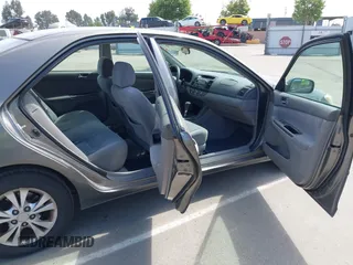 2005 Toyota Camry LE with VIN 4T1BF32K35U590150, listed as a IAAI auction lot 42053337 with 180,627 mi miles and . Bid and sale history available at DreamBid. Image 8.