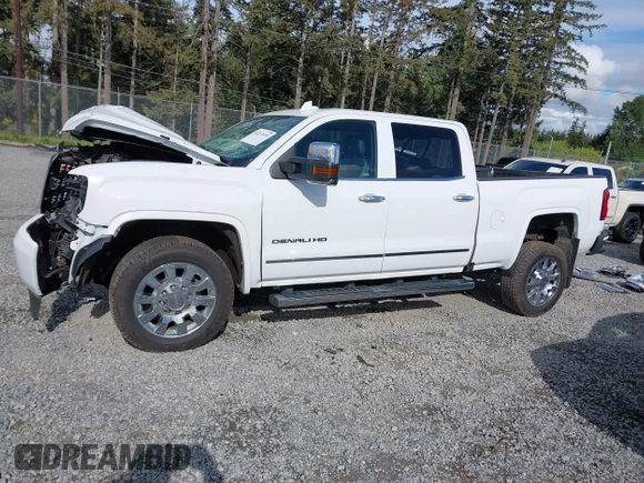 2019 GMC Sierra 2500HD Denali z VIN 1GT12SEY3KF269442, wystawiony jako IAAI lot #42231991 z przebiegiem 75 172 mil mil oraz . Historia ofert i sprzedaży dostępna na DreamBid. Obrazek 15.