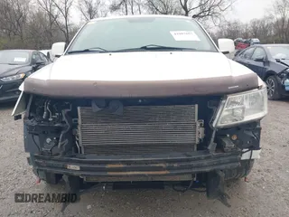 2012 Dodge Journey SXT with VIN 3C4PDCCG6CT132457, listed as a IAAI auction lot 41907657 with 169,160 mi miles and . Bid and sale history available at DreamBid. Image 6.