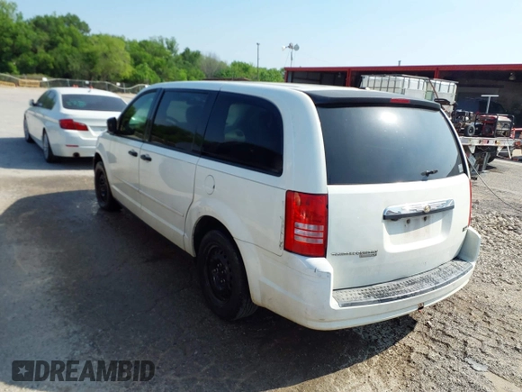 2008 Chrysler Town & Country LX with VIN 2A8HR44H18R749321, listed as a IAAI auction lot 41950374 with 167,210 mi miles. Bid and sale history available at carsss.com. Image 3.