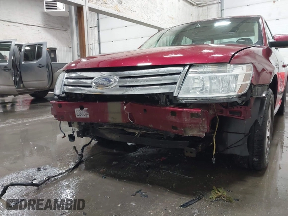 2008 Ford Taurus SEL with VIN 1FAHP27W38G172116, listed as a IAAI auction lot 41824616 with 176,864 mi miles. Bid and sale history available at carsss.com. Image 6.
