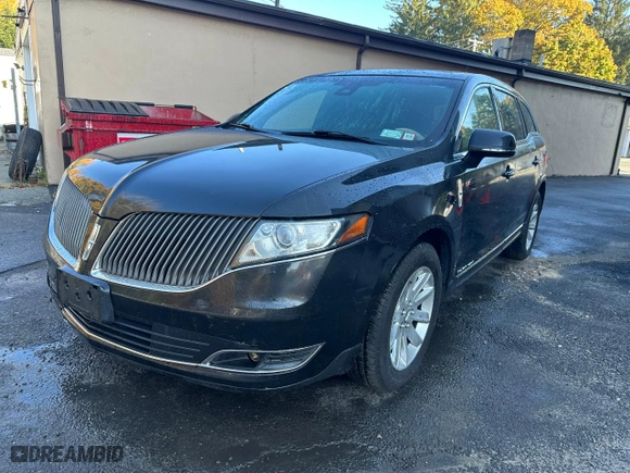 2015 Lincoln MKT with VIN 2LMHJ5NK0FBL03293, listed as a Copart auction lot 42715595 with 115,725 mi miles and Clean Title. Bid and sale history available at carsss.com. Image 2.