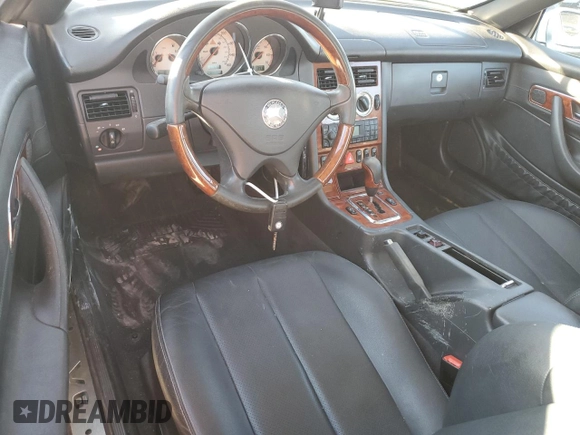 2004 Mercedes-Benz SLK-Class with VIN WDBKK65FX4F300214, listed as a Copart auction lot 82160974 with 75,964 mi miles and Salvage Title. Bid and sale history available at carsss.com. Image 8.