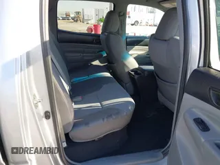 2013 Toyota Tacoma PreRunner with VIN 3TMKU4HN8DM034338, listed as a IAAI auction lot 41808842 with 142,012 mi miles and . Bid and sale history available at DreamBid. Image 8.