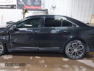 2015 Ford Taurus SHO with VIN 1FAHP2KT6FG137418, listed as a IAAI auction lot 42256452 with 140,335 mi miles and . Bid and sale history available at DreamBid. Image 14.